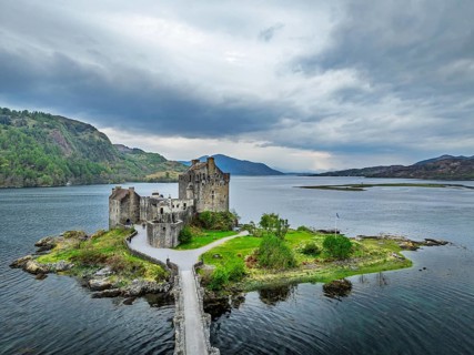 Eilean Donan Castle and Loch Duich from a drone, Isle of Skye, Highlands, Scotland, England, United