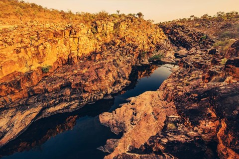 Bell Gorge waterfall, a body of water in north-west Australia in the Kimberley. Sunrise in the
