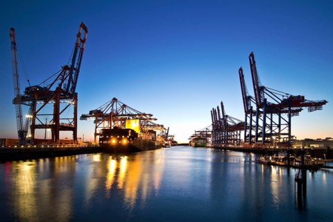 Container ships at Eurogate container terminal and Burchardkai in the evening, Port of Hamburg,
