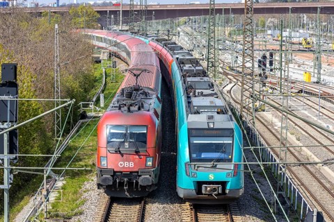 S-Bahn and EuroCity train of ÖBB Austrian Federal Railways in Stuttgart Untertürkheim, Germany