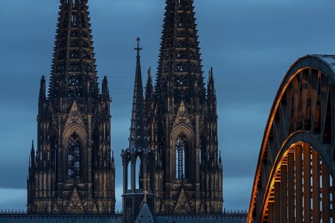 Cologne Cathedral and the Hohenzollern Bridge illuminated with LED lights, Cologne, North