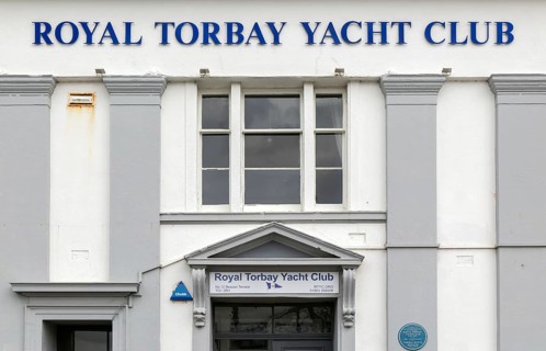 Royal Torbay Yacht Club sign on building, Torquay, Devon, England, UK