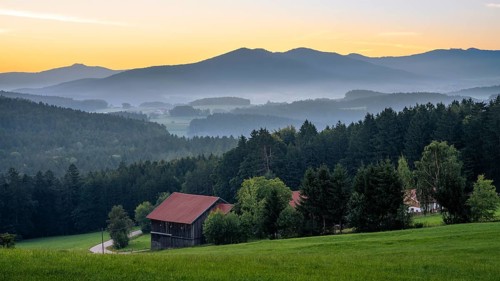 Landscape with forest, meadows and mountains around the town of Bad Kötzting, with the Kaitersberg