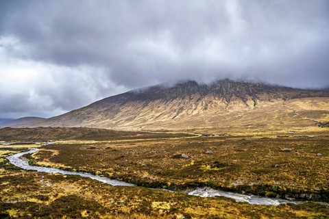 Eas a' Bhradain waterfall, Red Cuillin mountains, Loch Ainort, Isle of Skye, Scotland, UK