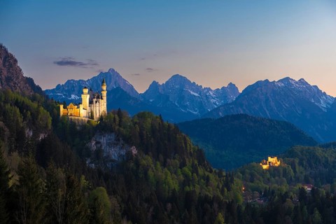 Historic castle in a magical mountain landscape at sunset, Neuschwanstein, Hohenschwangau,
