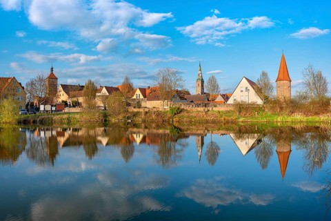 View of the old town in the evening light, Upper Tor, Liebfrauenmünster and Bürgerturm reflected in