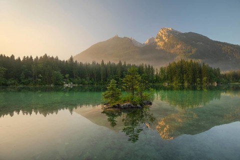 Magical sunrise with fog at Hintersee near Ramsau in Berchtesgadener Land