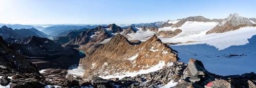 Rocky ridge on the Wilder Freiger mountain peak, behind Signal summit and Becher summit with