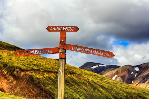 Signpost on the Laugavegur hiking trail, Landmannalaugar, remote hiking area in the Fjallabak