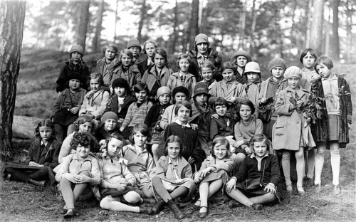 Group of children, 1920s, A large group of children sitting and standing in the forest, some in