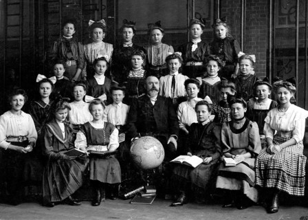 Girls class globe, 1930s, Group photo of a school class with teacher and globe, all in historical