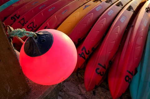 Kayaks, boats, colourful, lying on the beach, buoy, Étretat, Normandy, Seine-Maritime, France