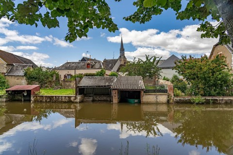 Moat in the old town of Bonneval, Centre-Val de Loire, France