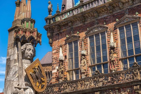 Roland statue on the market square in front of the town hall, symbol of medieval urban market law,