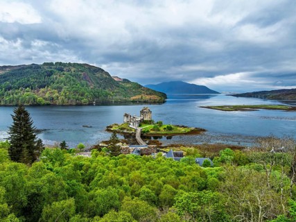 Eilean Donan Castle and Loch Duich from a drone, Isle of Skye, Highlands, Scotland, England, United