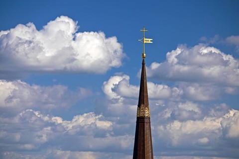 Spire of the main church St Katharinen with clouds, Hamburg, Germany
