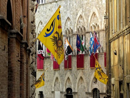 Il Palio di Siena, historic horse race, flags of the Contrade, Palazzo Chigi Saracini, historic