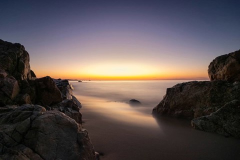The sun rises on the Costa Rei, a stretch of coastline on the Italian Mediterranean island of
