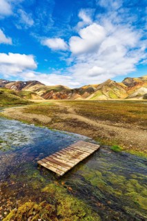 Volcanic landscape, colourful rhyolite mountains, ford, Cumulus, Landmannalaugar, remote hiking