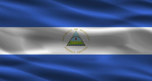 Nicaragua flag with fabric texture. Realistic flag of Nicaragua waving