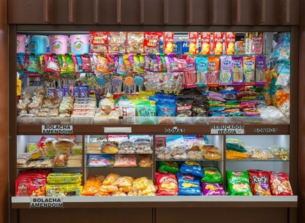 Shop stall selling sweets and snacks, Sao Bento railway station, Porto, Portugal