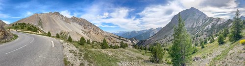 Panoramic view with left last bend of southern ramp southern ascent descent mountain road alpine