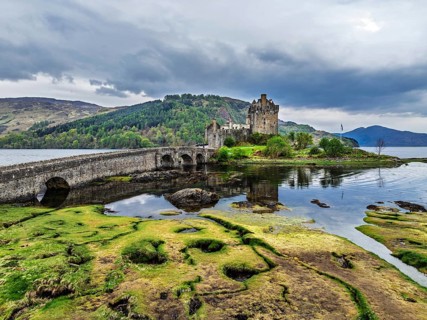 Eilean Donan Castle and Loch Duich from a drone, Isle of Skye, Highlands, Scotland, England, United