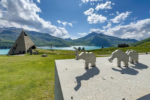 View from viewing platform to Mont-Cenis Pyramid Museum with stylised pyramid Museum in memory of