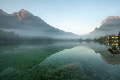 Magical sunrise with fog at Hintersee near Ramsau in Berchtesgadener Land