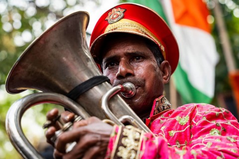 Members of Indian National Congress celebrate after Indian armed forces carried out Operation