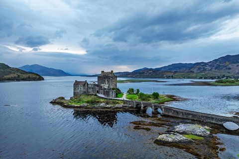 Eilean Donan Castle and Loch Duich from a drone, Isle of Skye, Highlands, Scotland, England, United