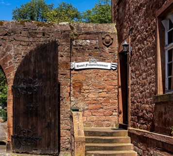 The old castle with Barbarossaplatz and the castle café in the old town centre of Büdingen, Hesse,