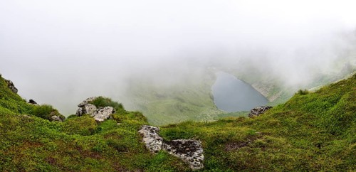 Wisps of mist drift over Kaltenbachsee, Schladminger Tauern, Sölktäler nature park Park, St.