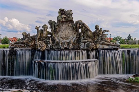 Bassin, a water basin, in front of Ludwigslust Palace, with cascades and stone figures.