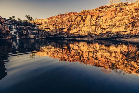 Bell Gorge waterfall, a body of water in north-west Australia in the Kimberley. Sunrise in the