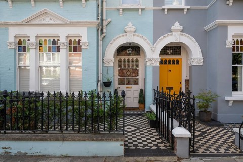 Victorian entrances, yellow door, black and white tile pattern, Kensington, London, England, Great