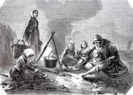 Fishing family, parents with four children, having dinner on the coast of Andresselles, Pas de