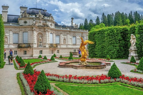 Baroque garden parterre with west side of Linderhof Palace, Ettal, Ammertal, Upper Bavaria,