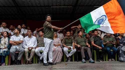 Members of Indian National Congress celebrate after Indian armed forces carried out Operation