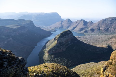 Evening mood at the Blyde River Canyon with Three Rondawels peak, view of the canyon with the Blyde