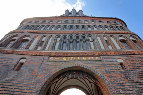Historic Holstentor with trapdoor, view upwards, perspective, Brick Gothic, brick building, city