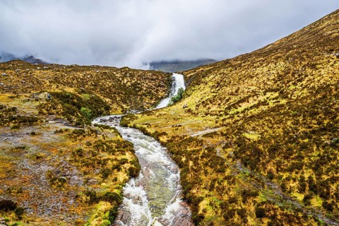 Eas a' Bhradain waterfall, Red Cuillin mountains, Loch Ainort, Isle of Skye, Scotland, UK