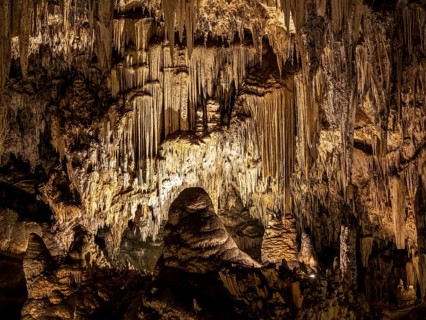 Cueva de Nerja, illuminated cave, large stalagmites and stalagtites, Nerja, Andalusia, Spain