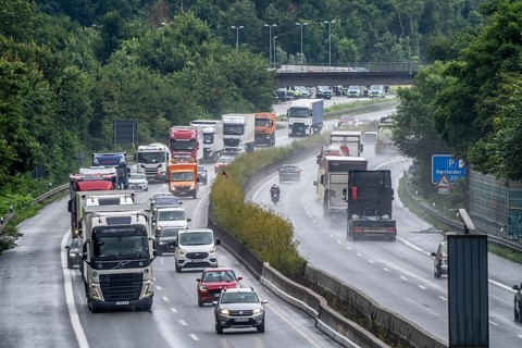 Heavy traffic, mainly lorries, on the A40 motorway near Rheurdt, at the Neufelder Heide rest area,