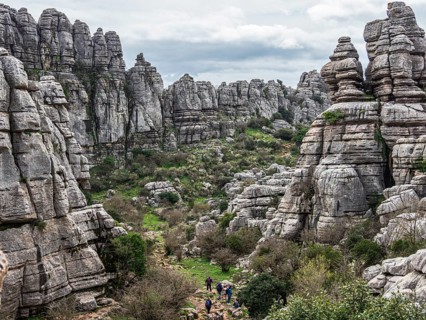 Hikers in the El Torcal de Antequera mountain range, hiking path, rock formations, Andalusia, Spain