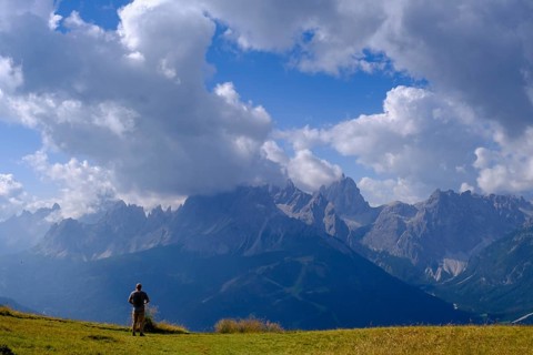 Mountaineer on the helmet, view of the Sesto sundial, Sesto, Dolomites, Val Pusteria, South Tyrol,