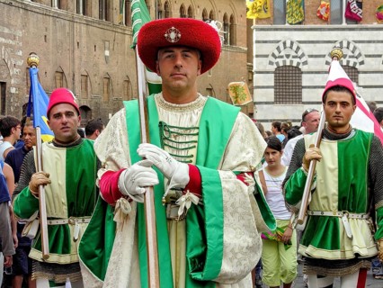 Il Palio di Siena, historical horse race, flag bearer of the Contrada dell Oca, goose, parade in