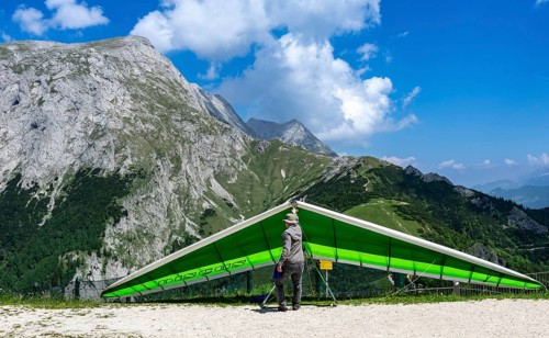 Paragliders preparing for flight, Jenner, Schönau am Königssee, Bavaria, Germany