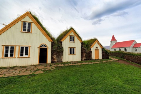 Grass sod houses and church, green roofs, peat farm or peat museum Glaumbaer or Glaumbær, open-air