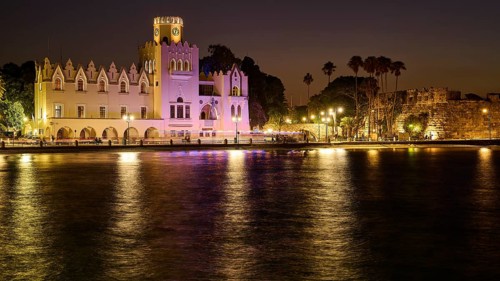 Palace of Justice, colonial building, night shot of a historic building with lights, palm trees and
